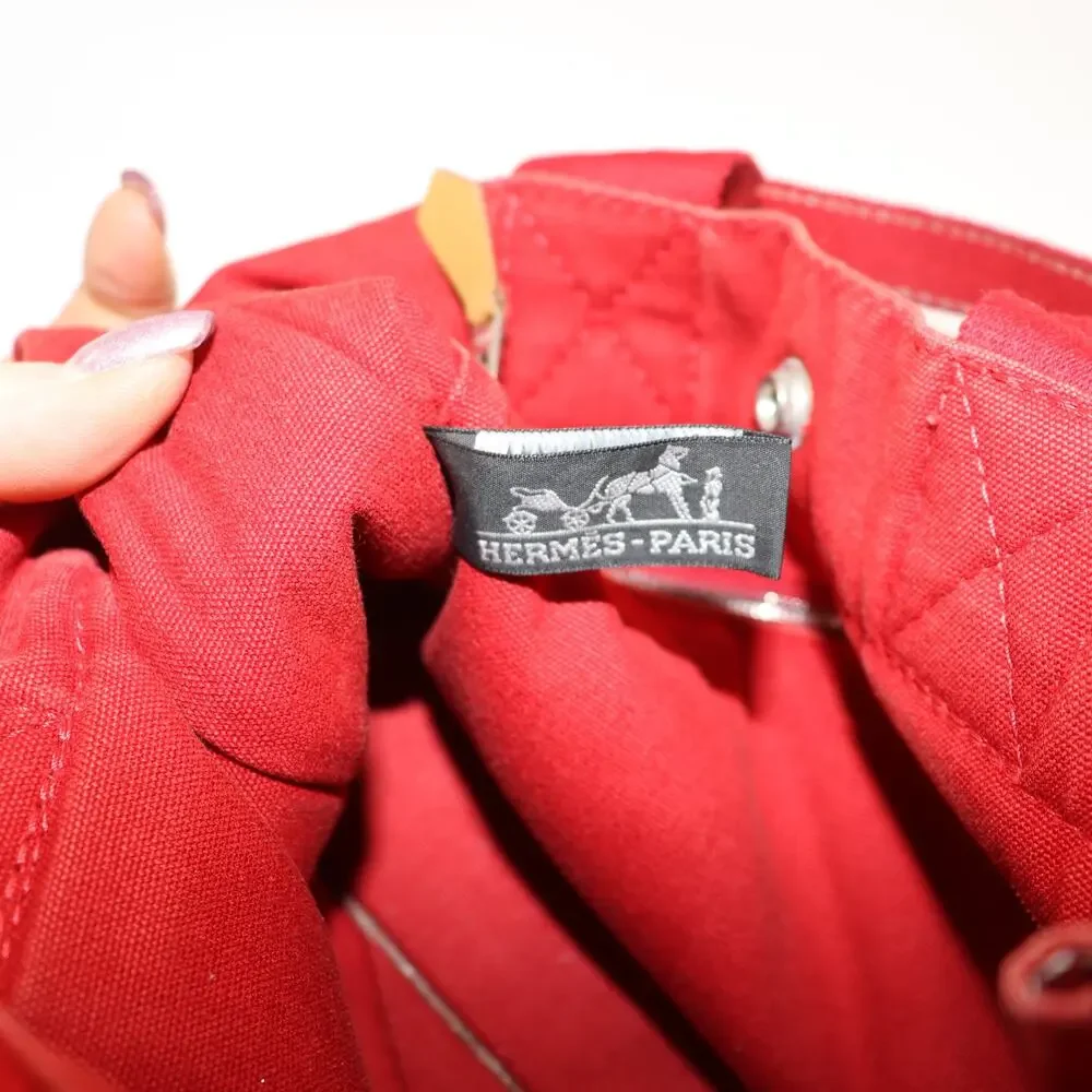 Hermès Red Canvas Small Tote Bag – Classic French Luxury‎ with Snap Closure